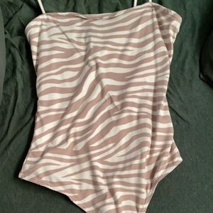 pink zebra body suit